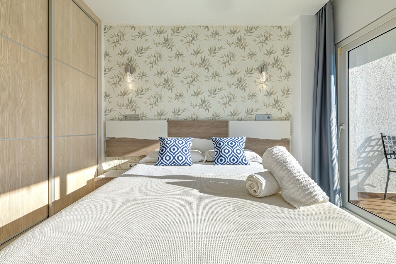 Double bed and built-in wardrobe storage