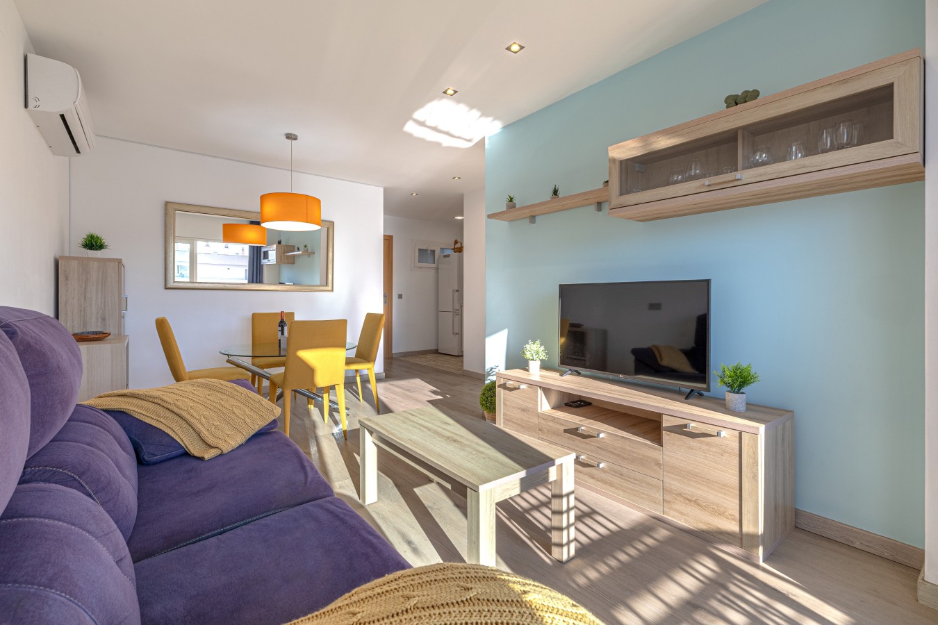 Living area with the dining table beyond