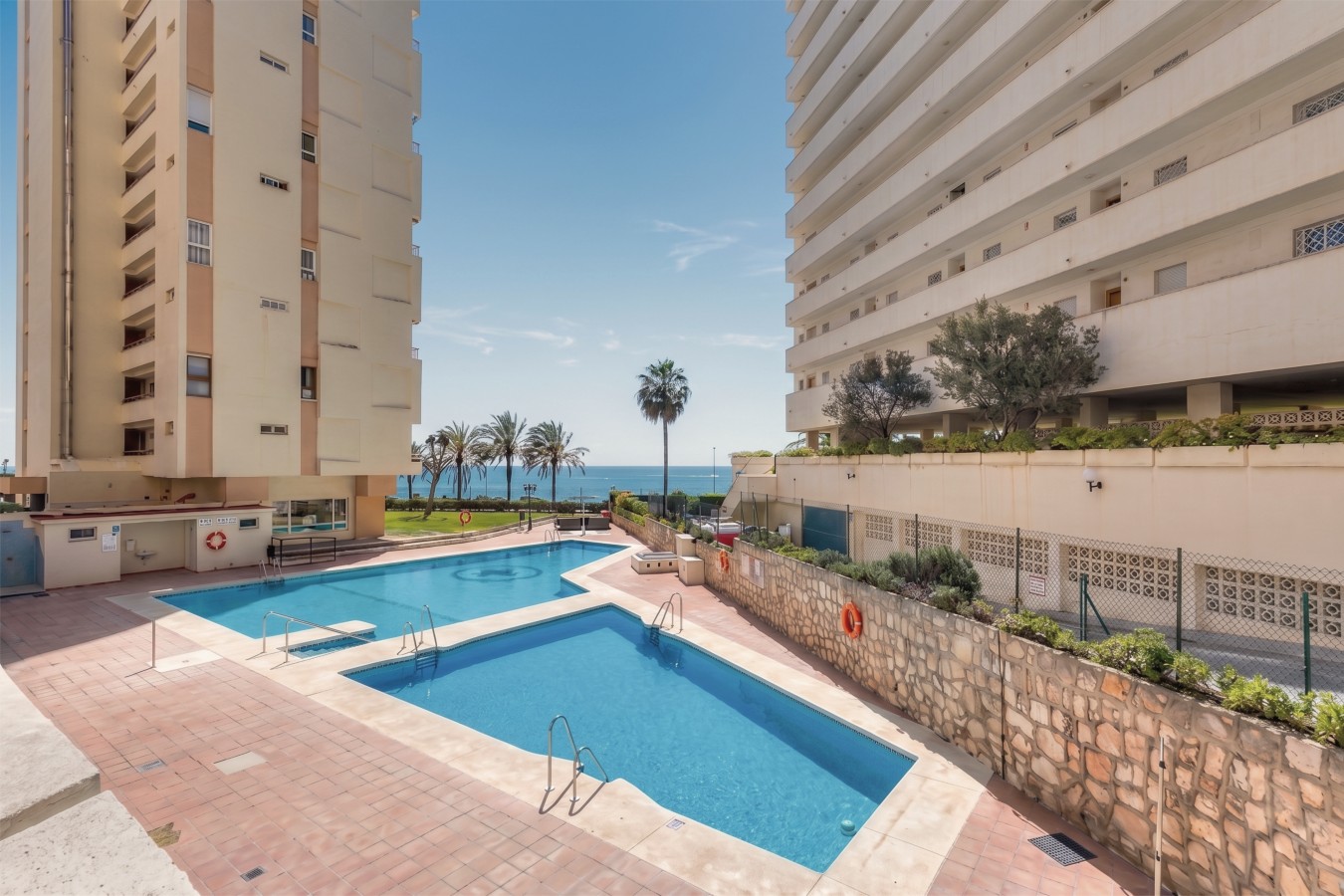 The building's communal pool, open June to August