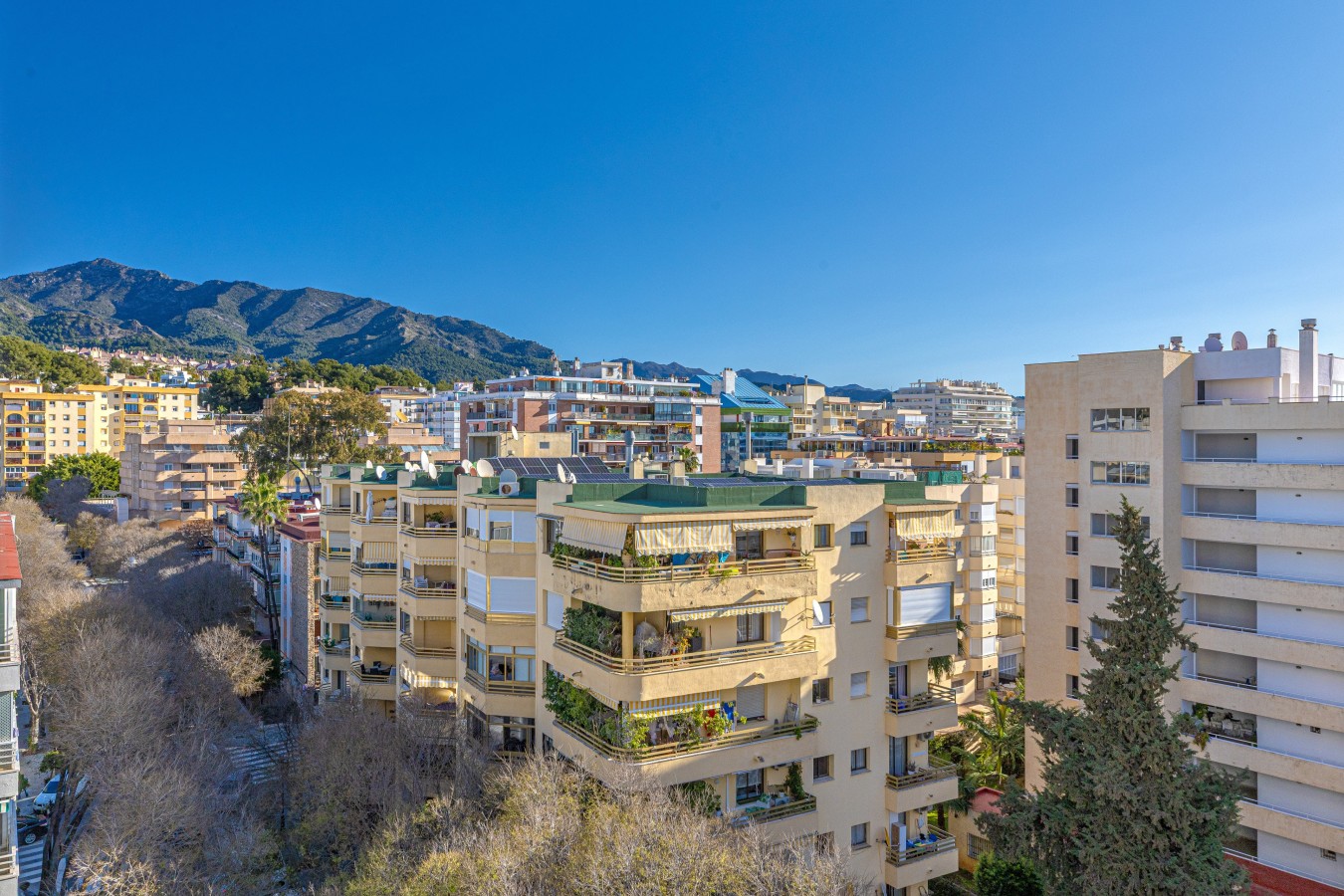 The mountains behind Marbella from the other end of the terrace