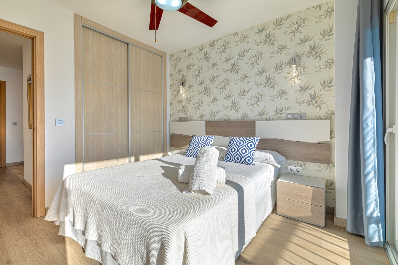 Double bed with fitted wardrobes