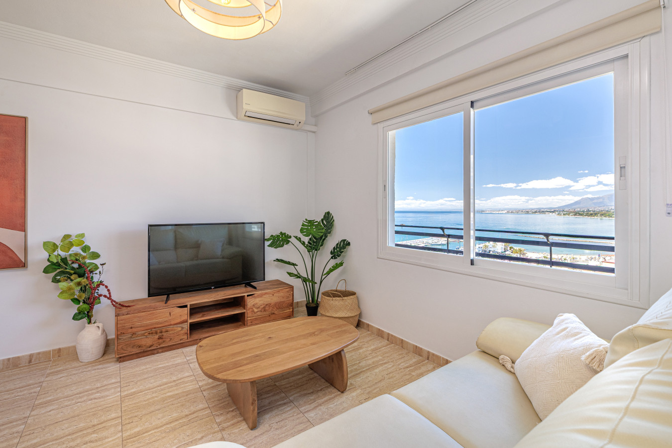 Unwind in the lounge after a day at the beach, complete with a flat-screen TV.