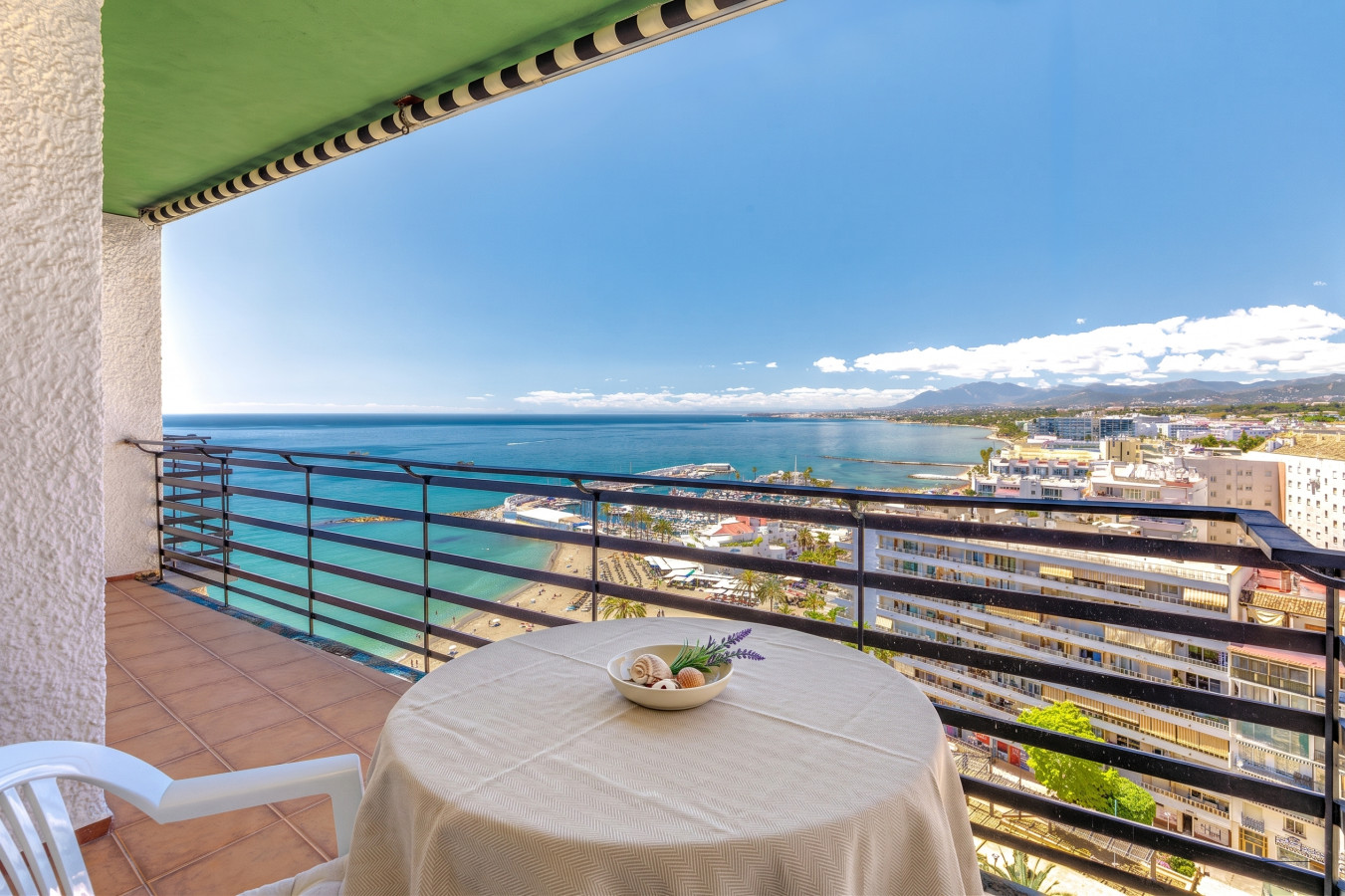 Private balcony with stunning Mediterranean Sea views in central Marbella.