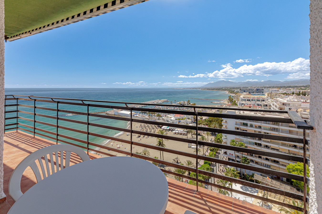 Dine al fresco on your private balcony while enjoying sweeping, panoramic views of the Mediterranean Sea and the vibrant Marbella coastline.