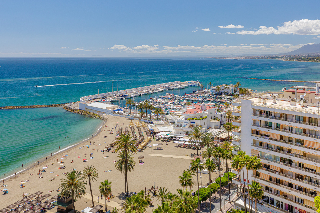 Just steps away from the golden sands of Marbella beach and the pier.
