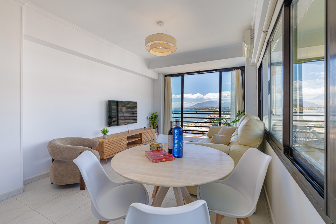 Dining area with a spectacular sea view backdrop.