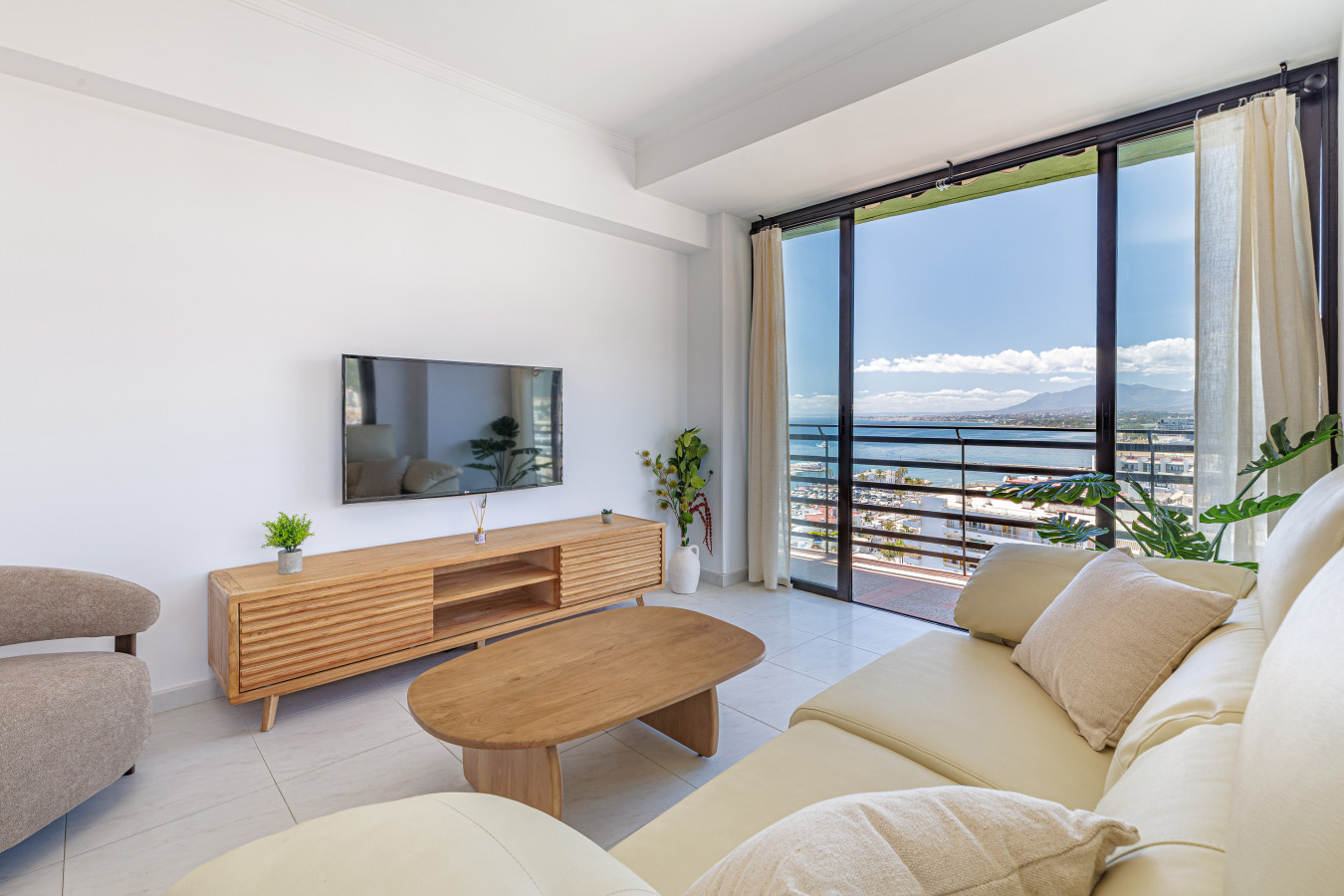Unwind in the air-conditioned living room after a day at the beach.