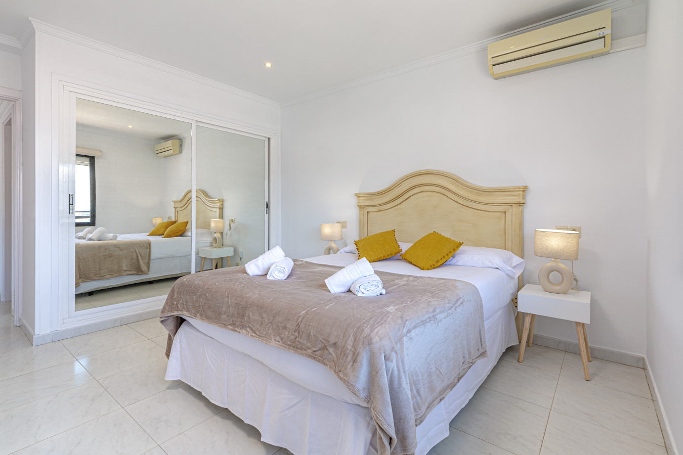 Spacious bedroom with ample wardrobe storage for longer stays.