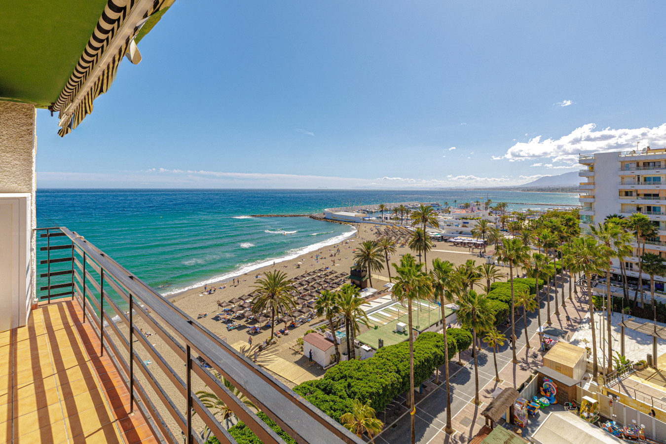 Watch the waves and vibrant Marbella beach life from above.
