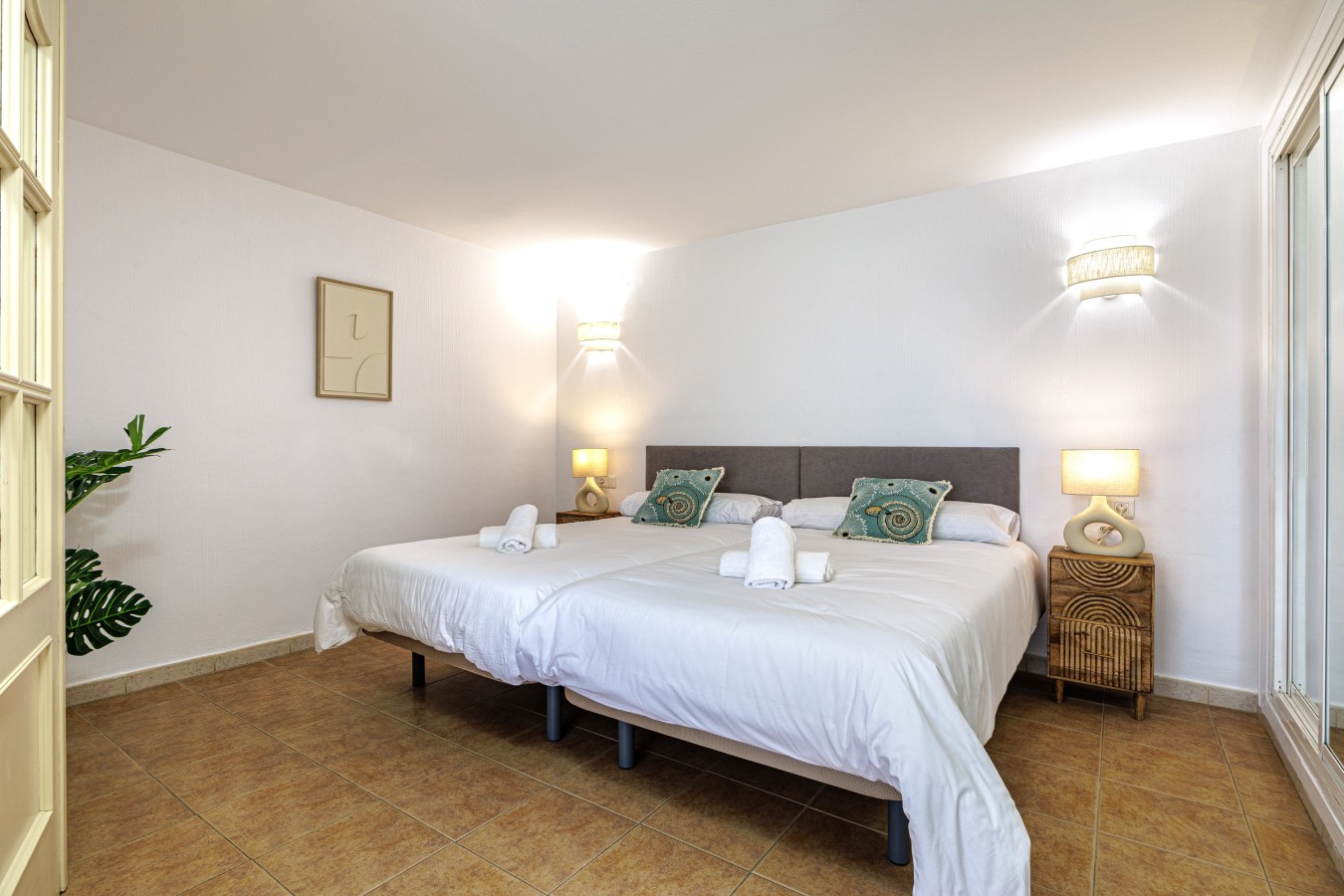 Bedroom with fresh linen and bright morning light