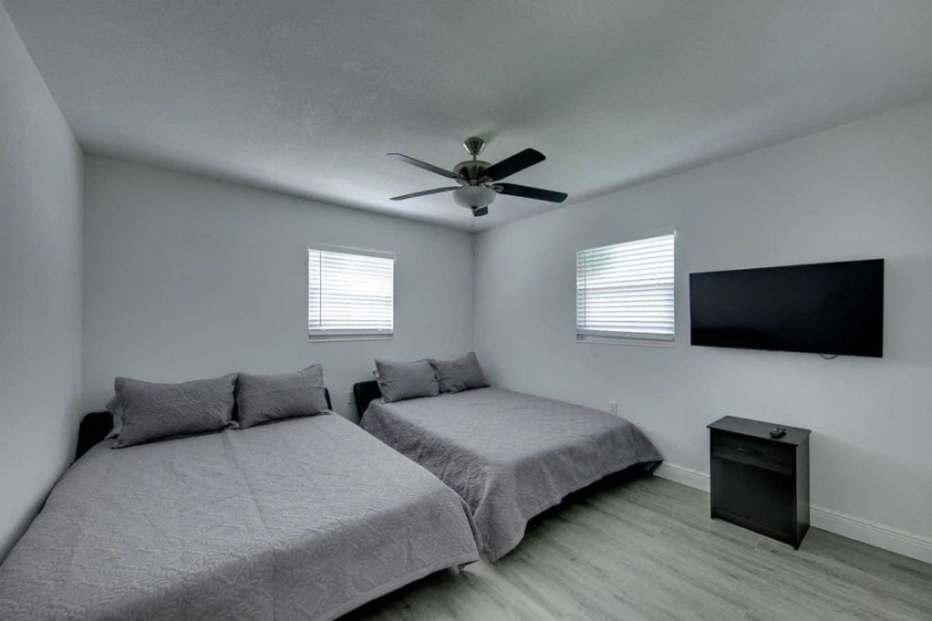 The fourth bedroom rounds out the sleeping arrangement with its own two queen beds.