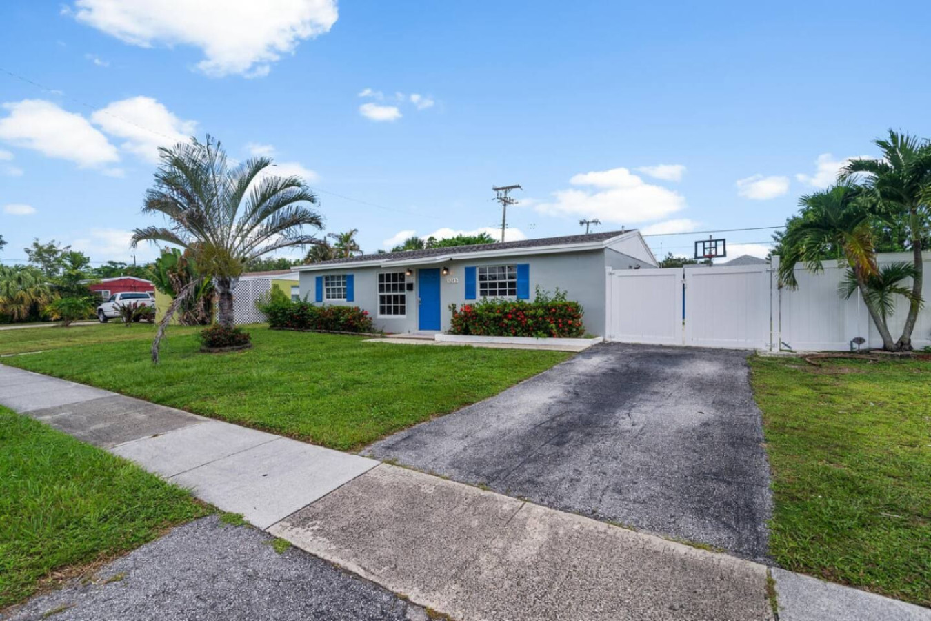 The driveway fits 4 cars, with room for more parking on the grass beside it, enough for a group arriving in separate vehicles.
