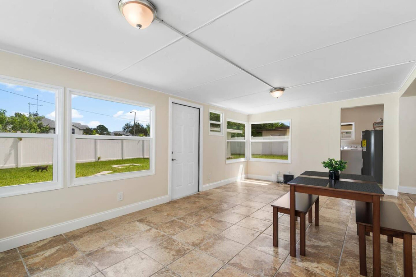 Meals in the sunroom come with a direct view of the backyard, the group circle outside always just a few steps away.