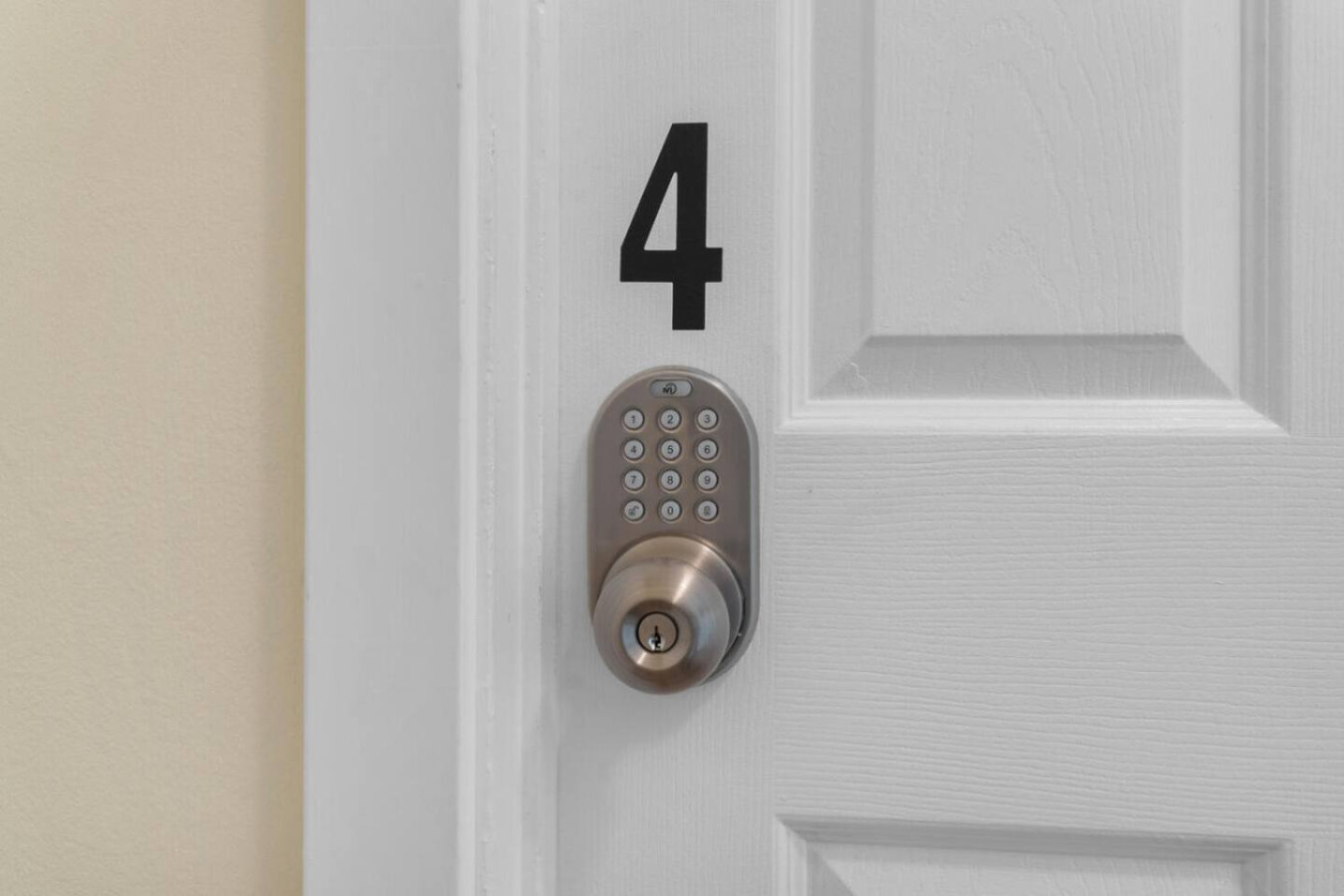 The keypad lock on bedroom door 4.