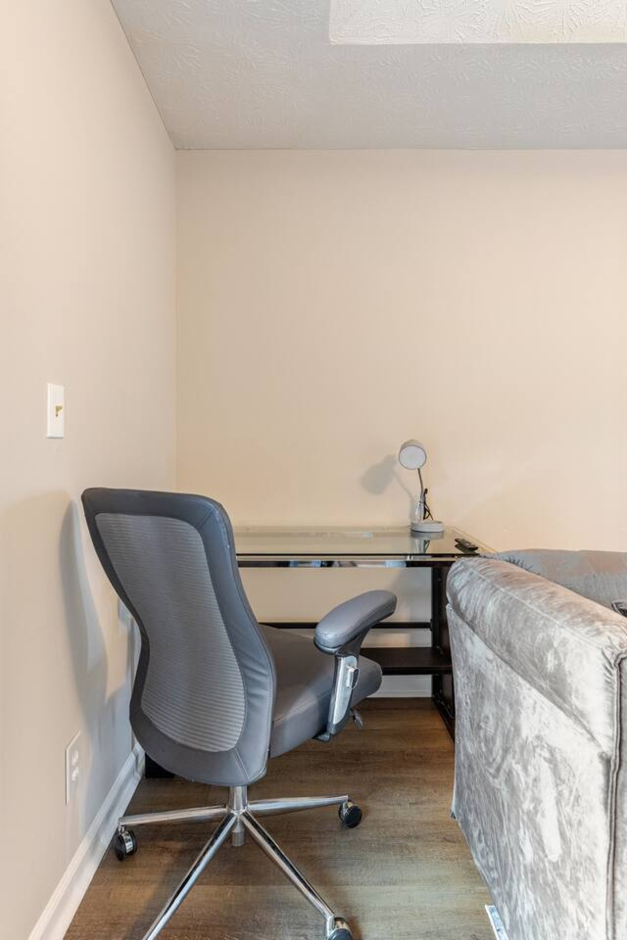 A desk, office chair and WiFi make the living room workable for remote work, schoolwork or a round of email.