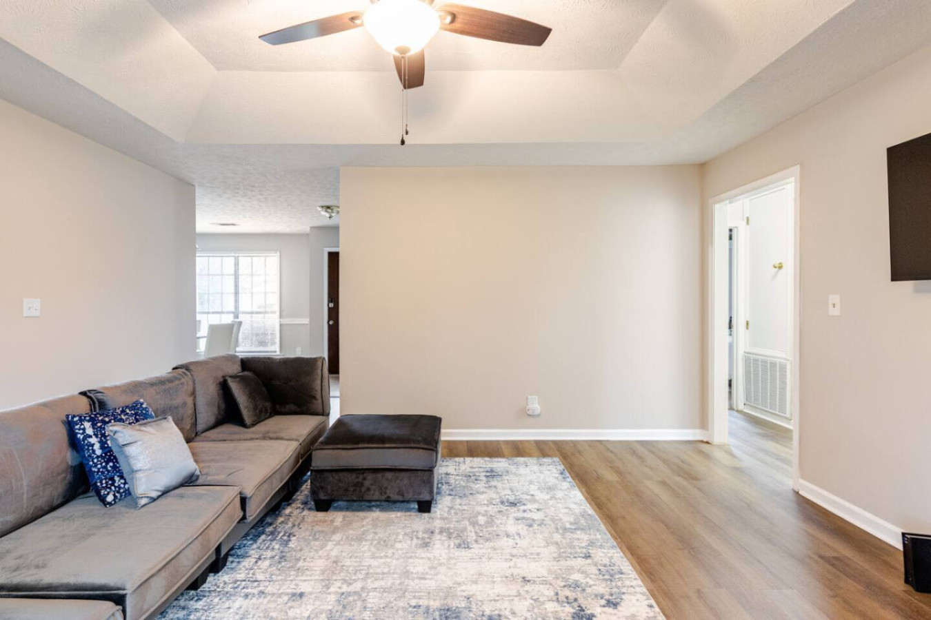 After a day of sightseeing, meetings or campus visits, the sectional and ottoman leave room for everyone to stretch out.