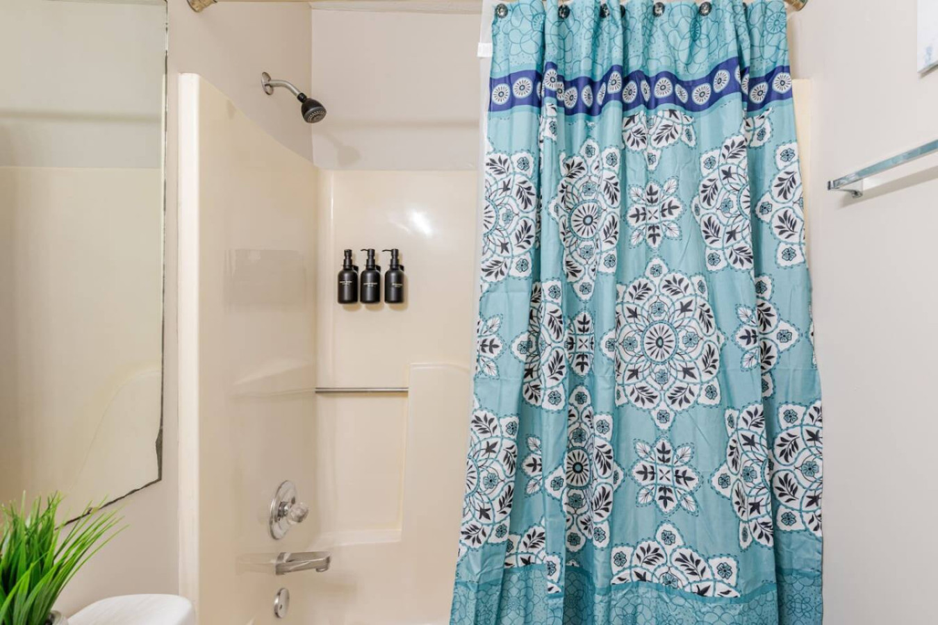 The shared full bathroom has a tub and shower, with soap, shampoo and conditioner provided.