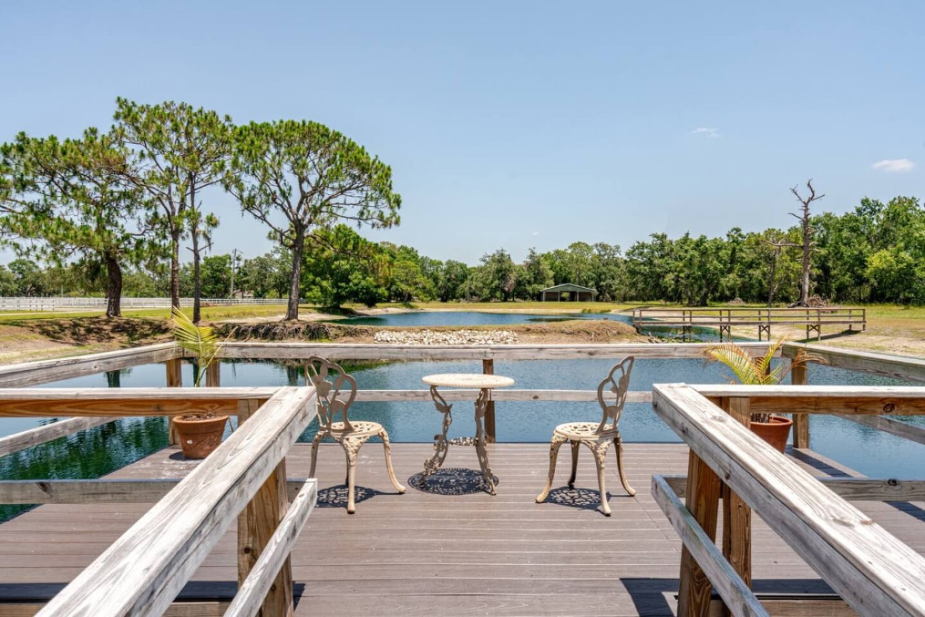 Simple seating set right on the dock, the water audible against the posts below.