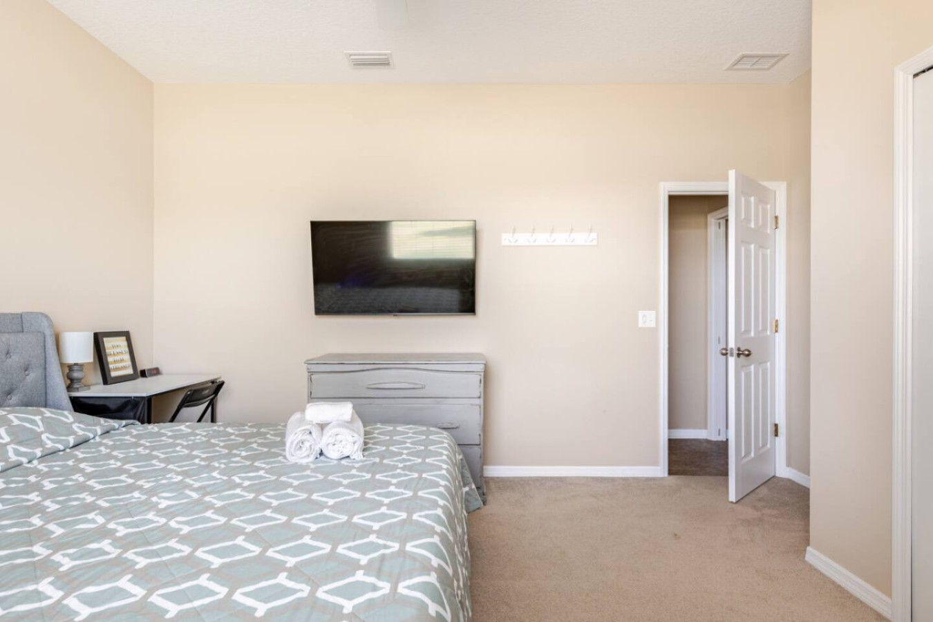 This bedroom also has a TV, one of the small comforts that add up across a multi-night stay.