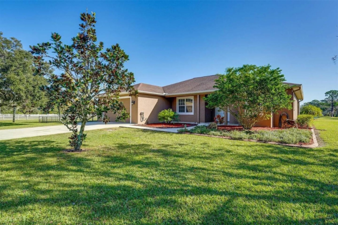A straight-on look at the front of the house, solid and low-key, built for a group that wants comfort more than showiness.