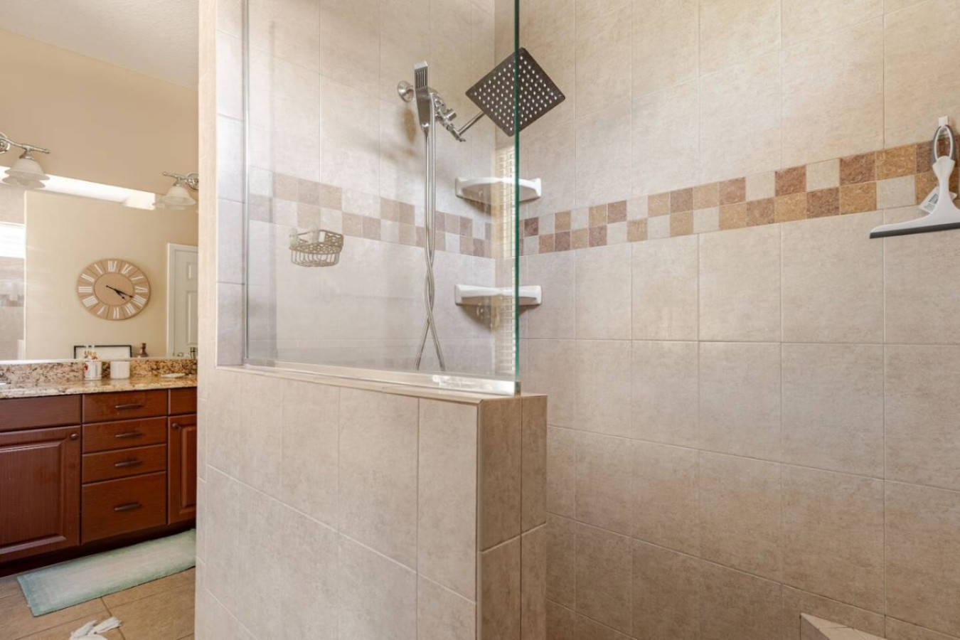 A walk-in shower in one of the home's bathrooms.
