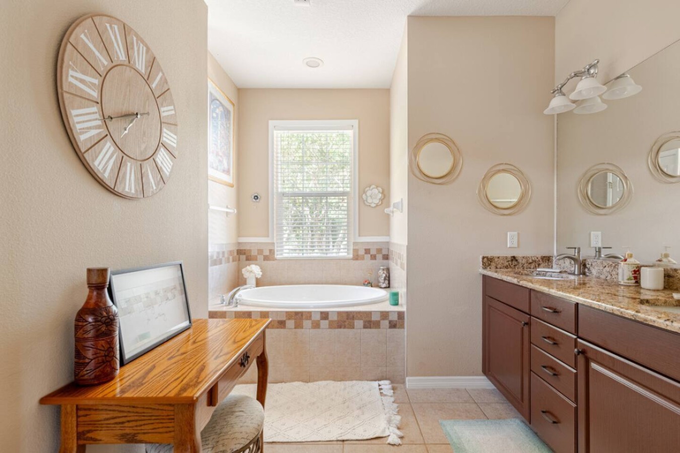 A soaking tub, one of three full bathrooms serving the house.