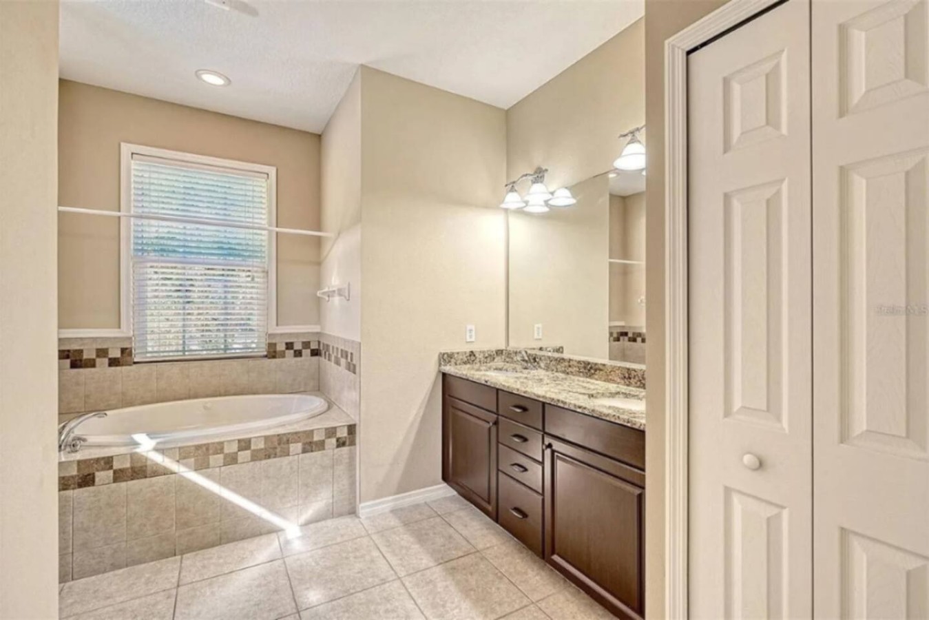 Tub and vanity in one of the home's shared bathrooms.