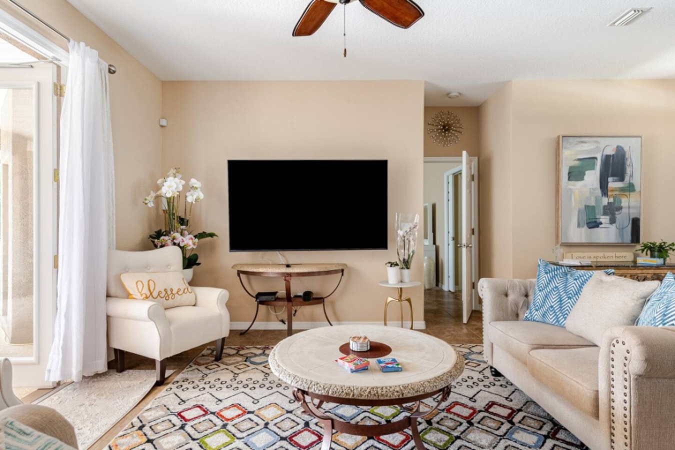 A separate seating area with TV, for the half of the group that wants a movie over conversation.