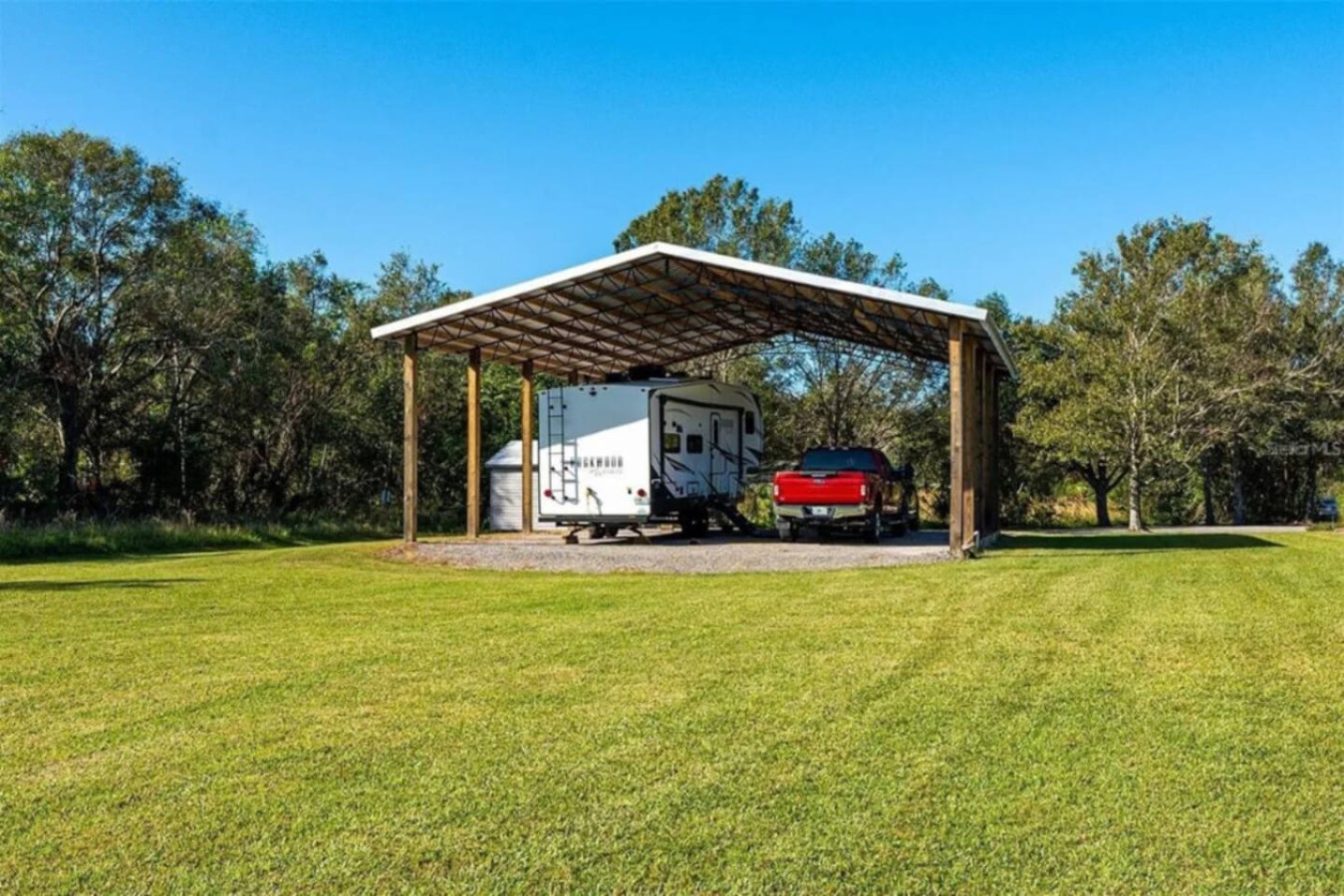 The pavilion again, open on all sides to the surrounding acreage.