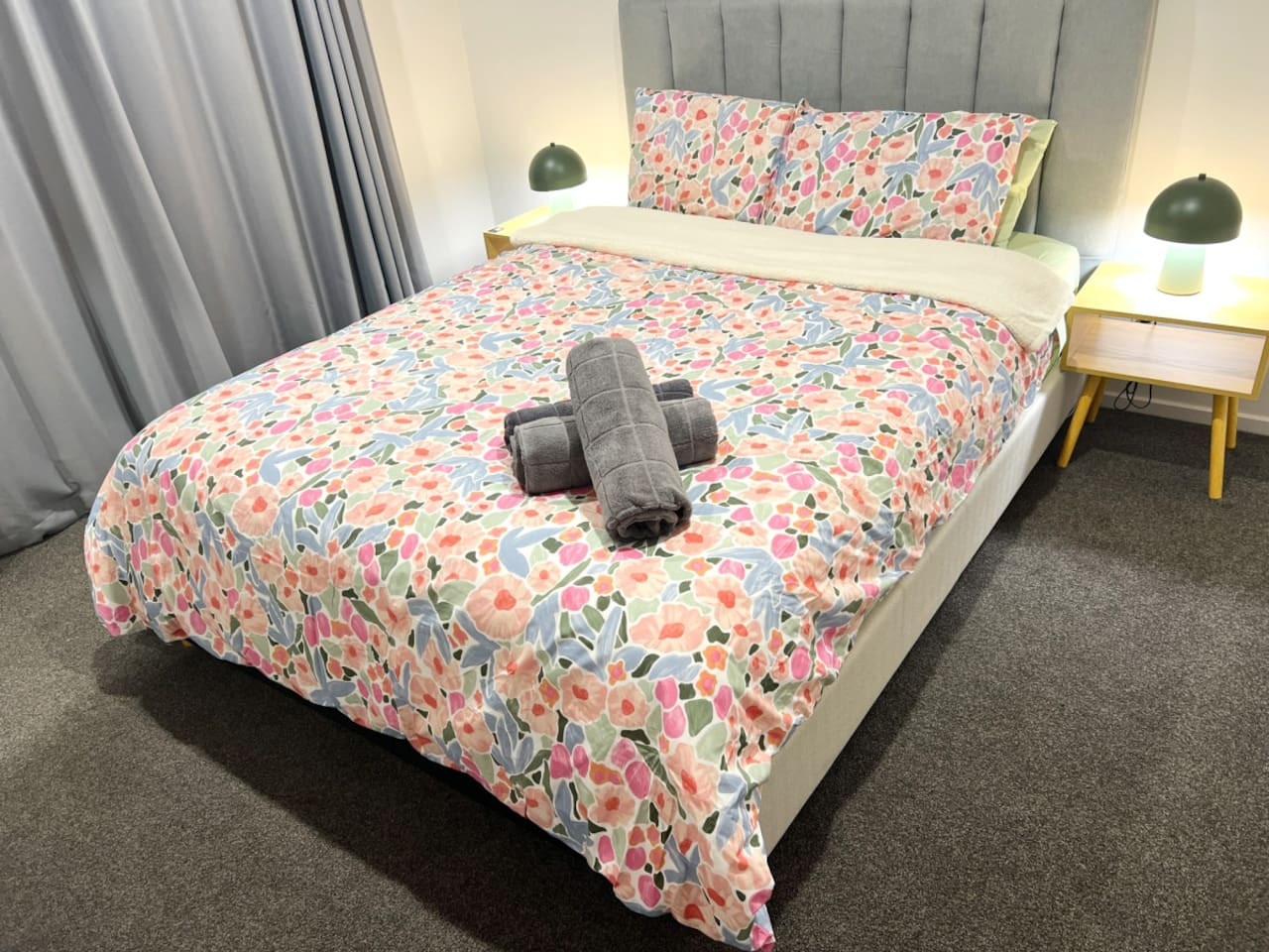 Bedroom 1 with bedside lamps