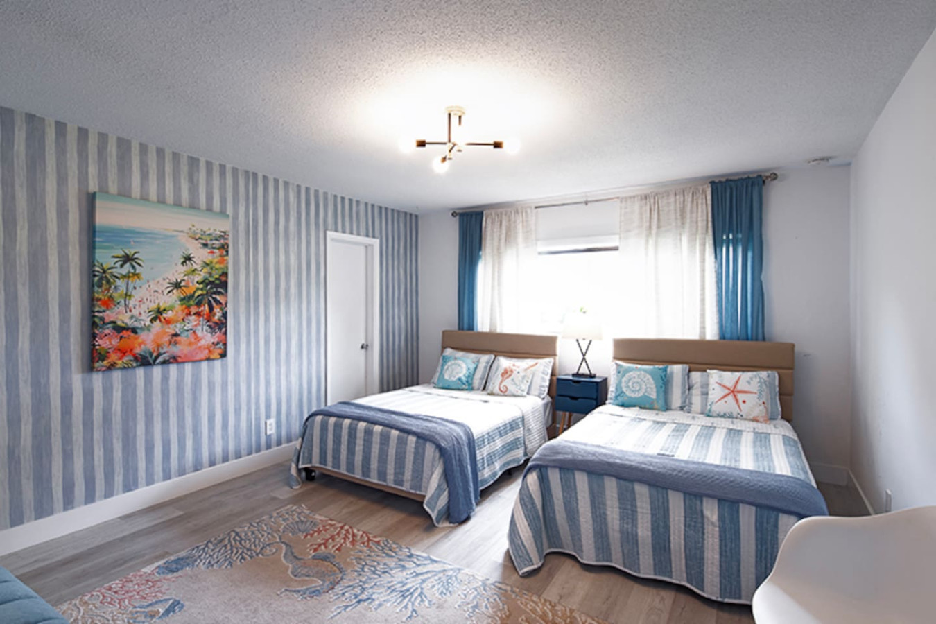 Suite with 2 Full beds and large Smart TV