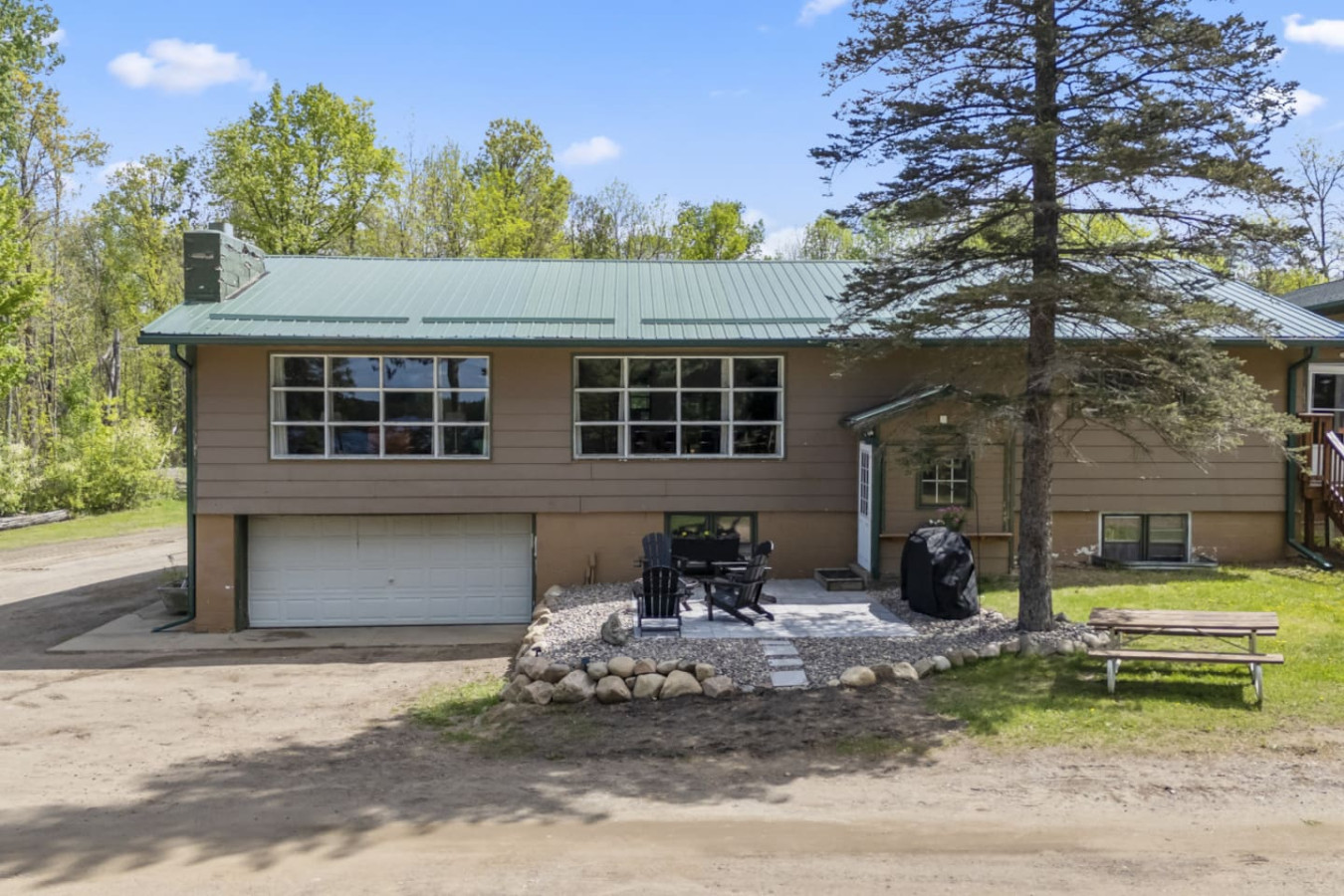 Front of Classic Cabin onsite property managers stay in lower level do not share entrance
