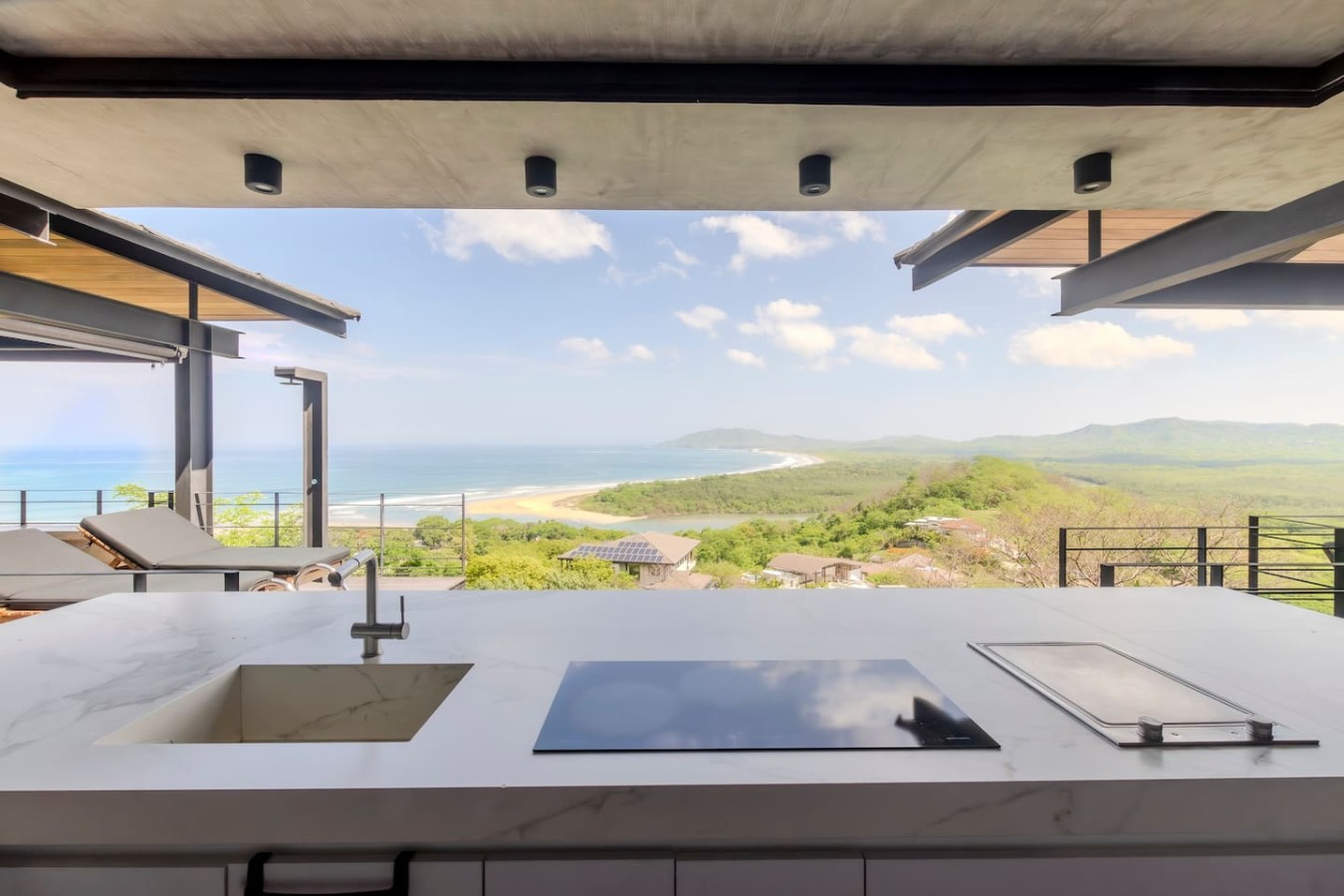 Imagine starting your day with coffee in this stunning kitchen! Fully equipped including a dishwasher for ultimate relaxation. Focus on the breathtaking views not cleanup! Your perfect Costa Rican getaway awaits. Message us to book your serene escape