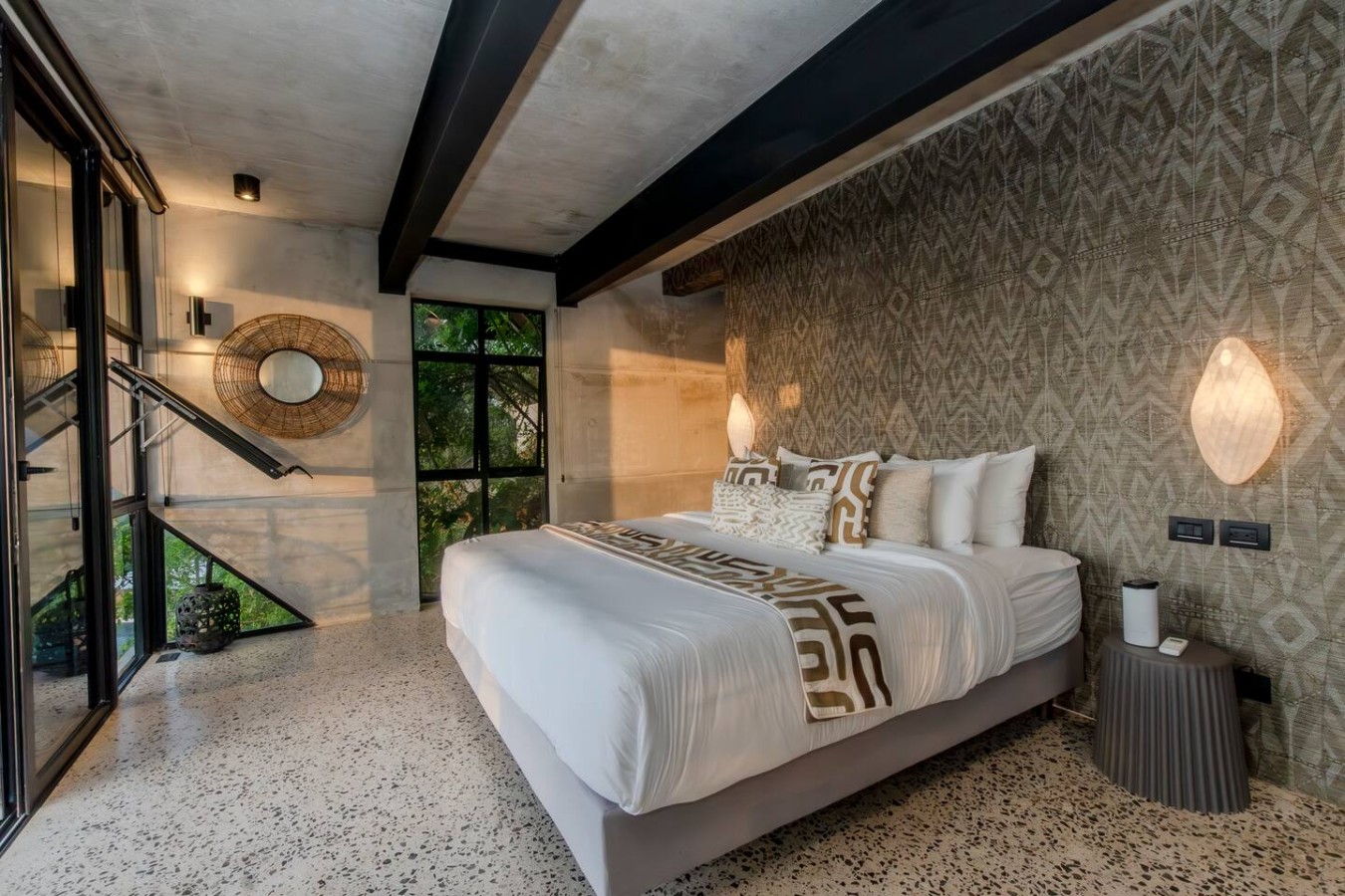 Indulge in ultimate privacy! This room offers a comfortable king bed A/C and a private balcony. Featuring an adjoined bath and a dedicated closet for you. Ask us about special rates for longer stays or seasonal pricing. Your Costa Rica escape awaits!