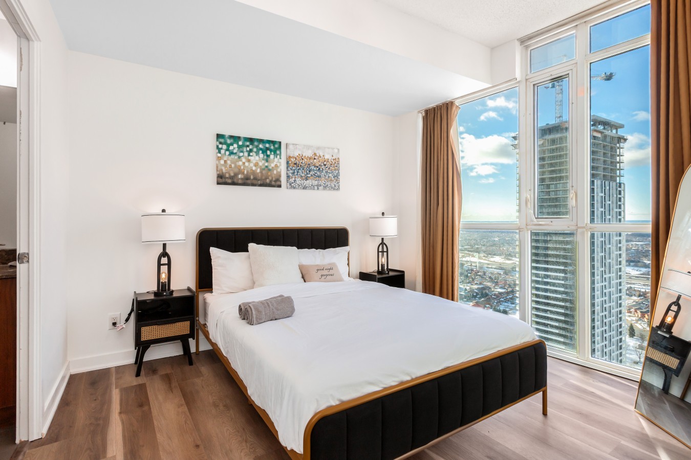 Sky-High 2BR/2BA Condo | Best City Views+Parking — furnished suite photo 16 in Mississauga