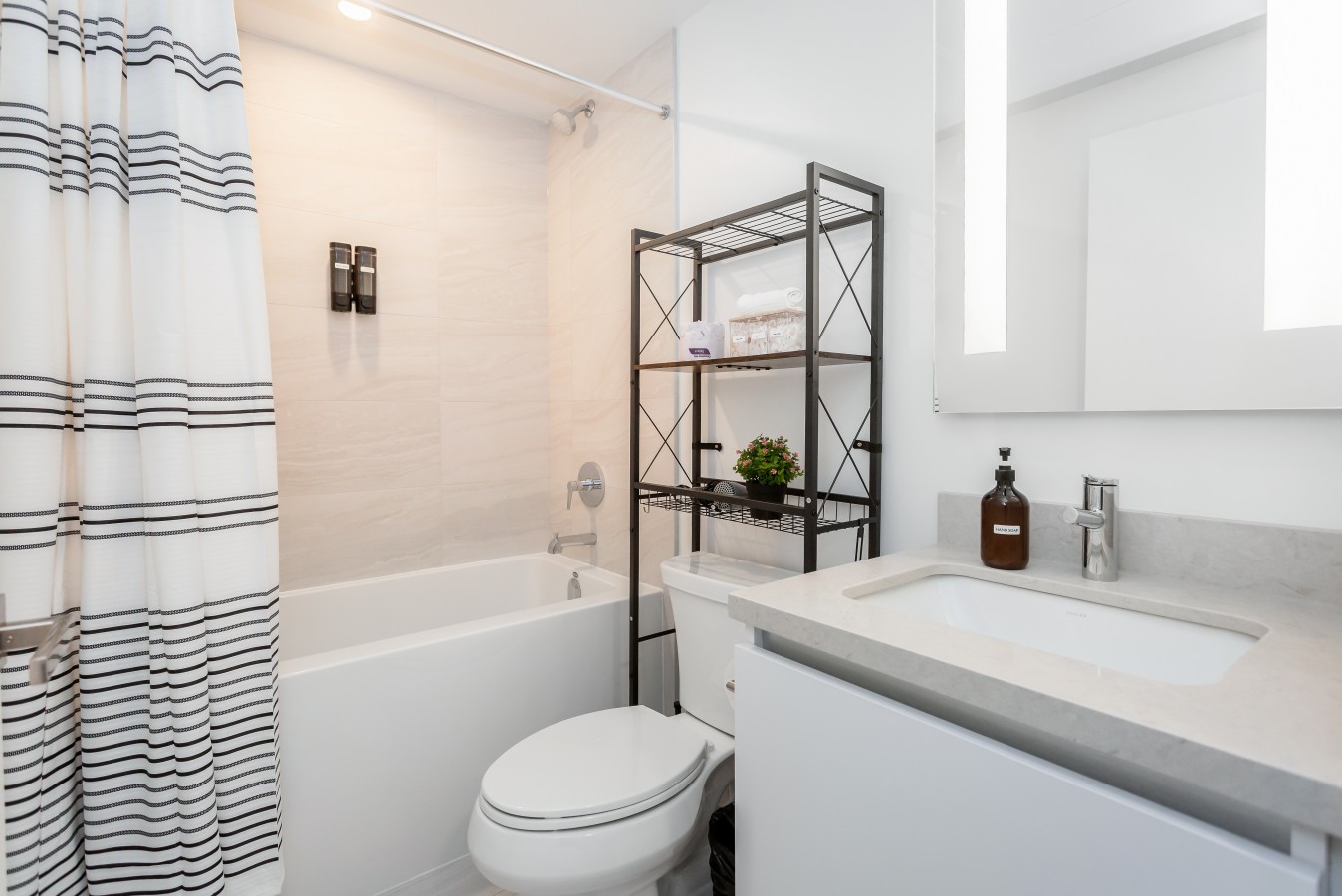 Sunset Retreat | 2BR/2BA | CN Tower View + Parking — furnished suite photo 2 in Mississauga
