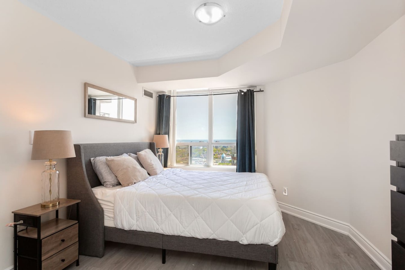 Stylish 2BR Retreat Steps to SQ1 | Prime Location — furnished suite photo 10 in Mississauga