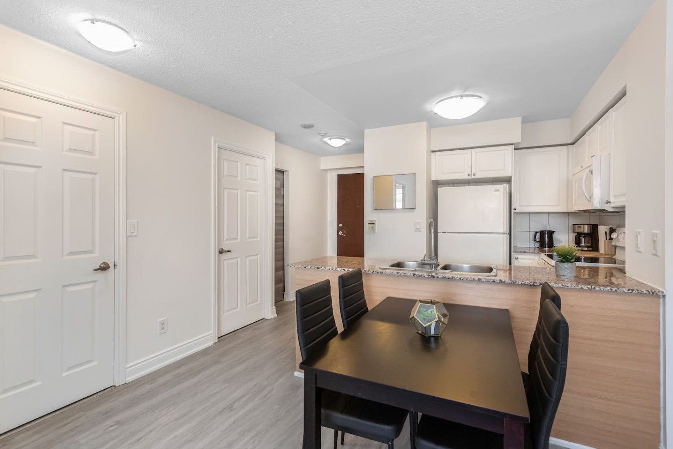 Stylish 2BR Retreat Steps to SQ1 | Prime Location — furnished suite photo 36 in Mississauga