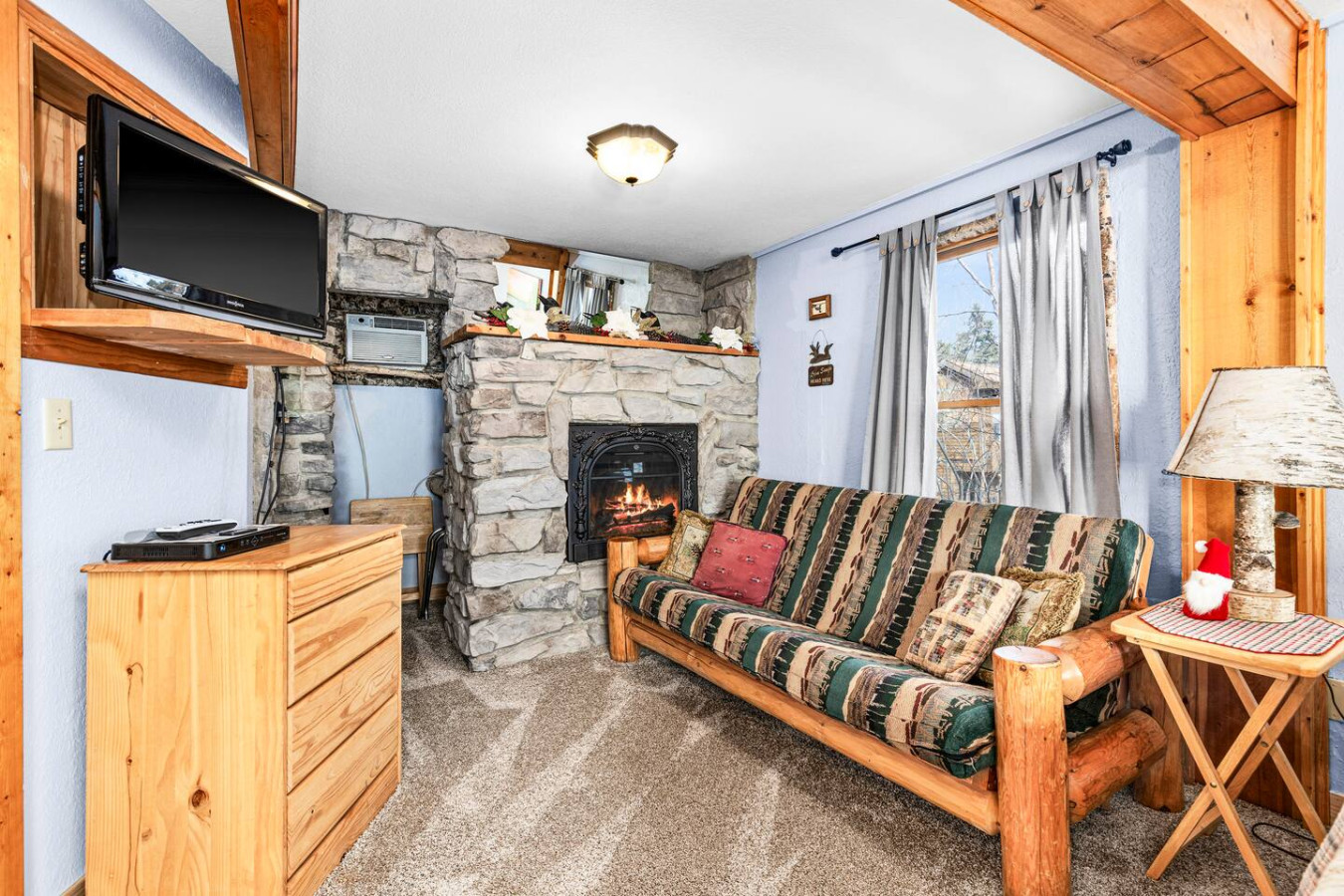 Electric fireplace and living space.