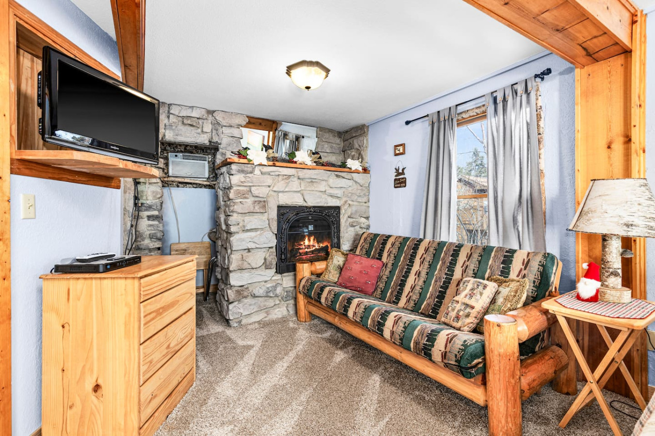 Electric fireplace and living space.