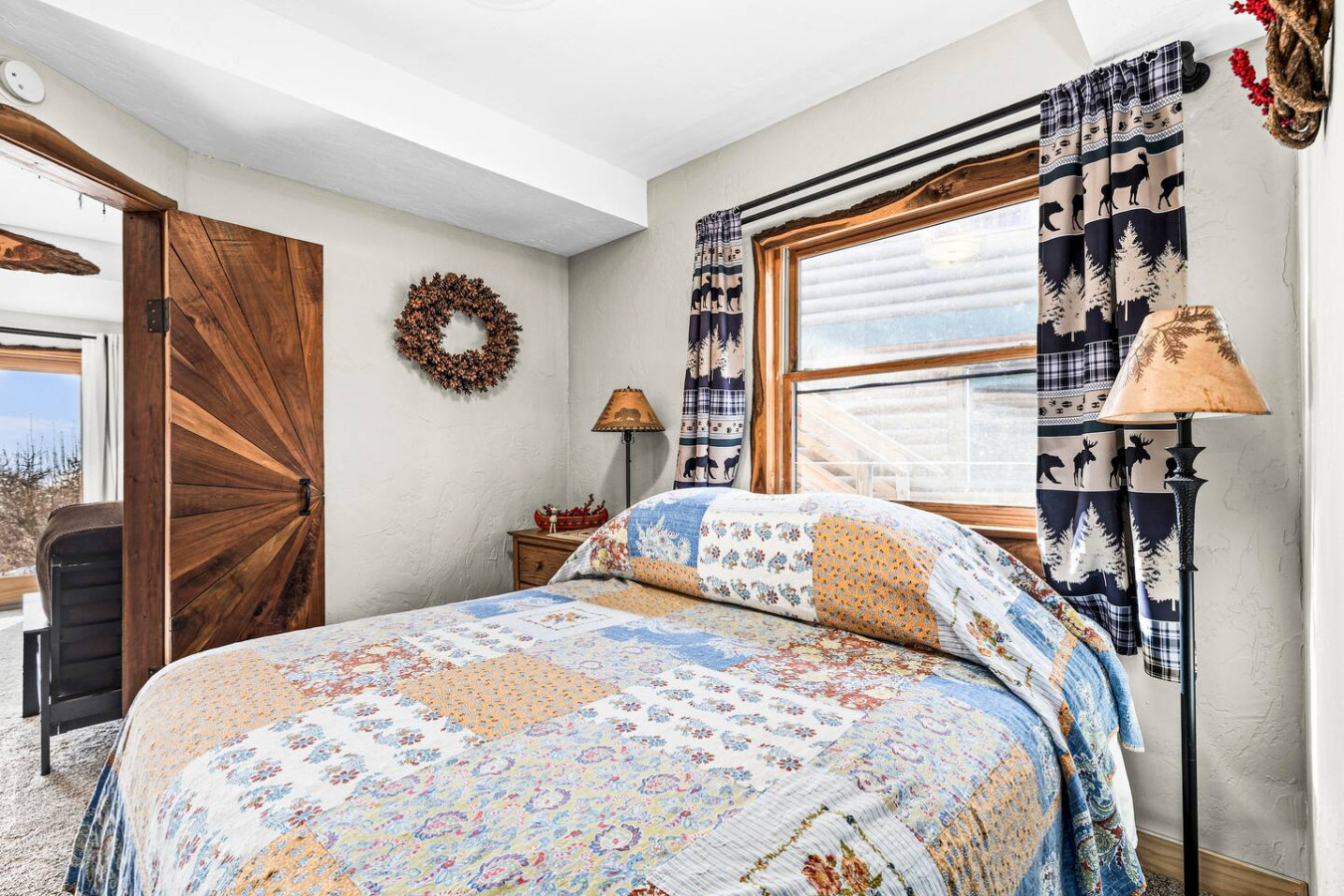 Separate bedroom with queen bed