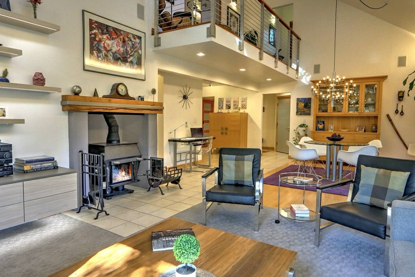 Open floor plan with living room, dining room and balcony