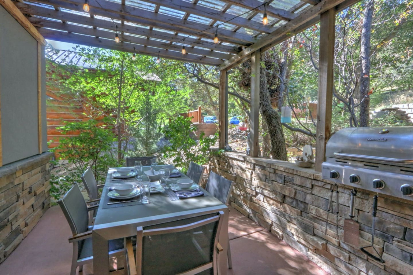 Kitchen patio dining area with grill