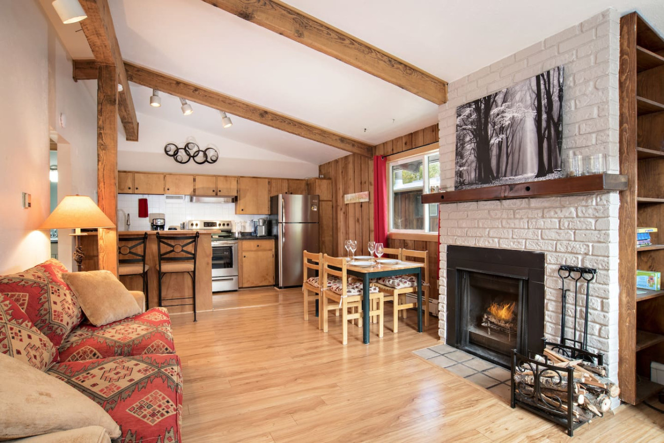 Living room with wood burning fireplace