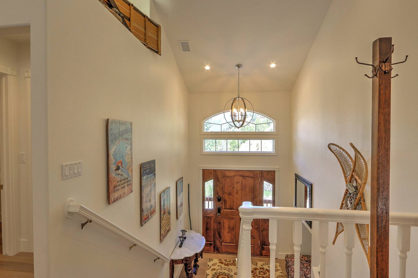 Front entry and steps to upper level dining area and kitchen