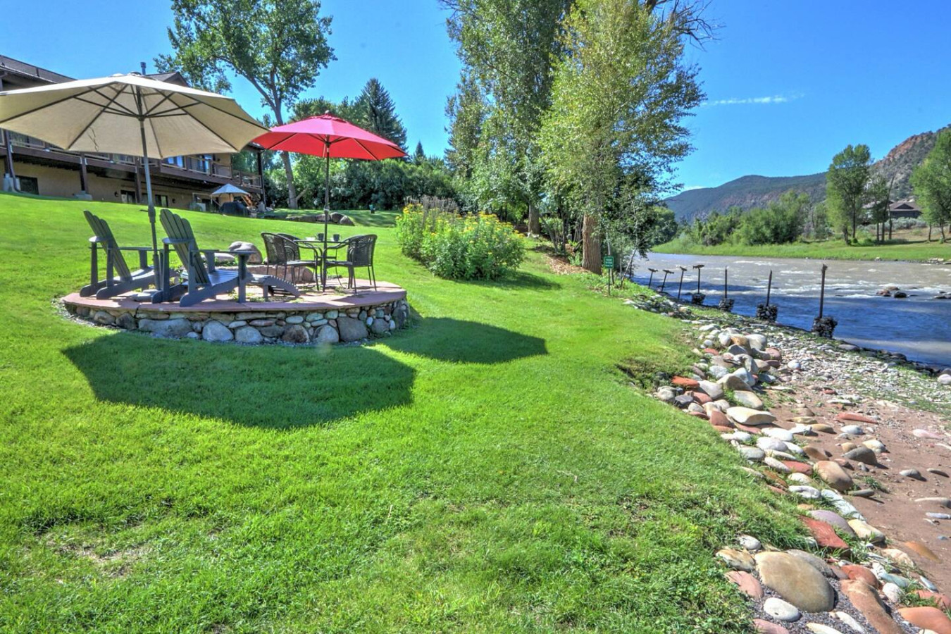 View of river and lower patio seating area