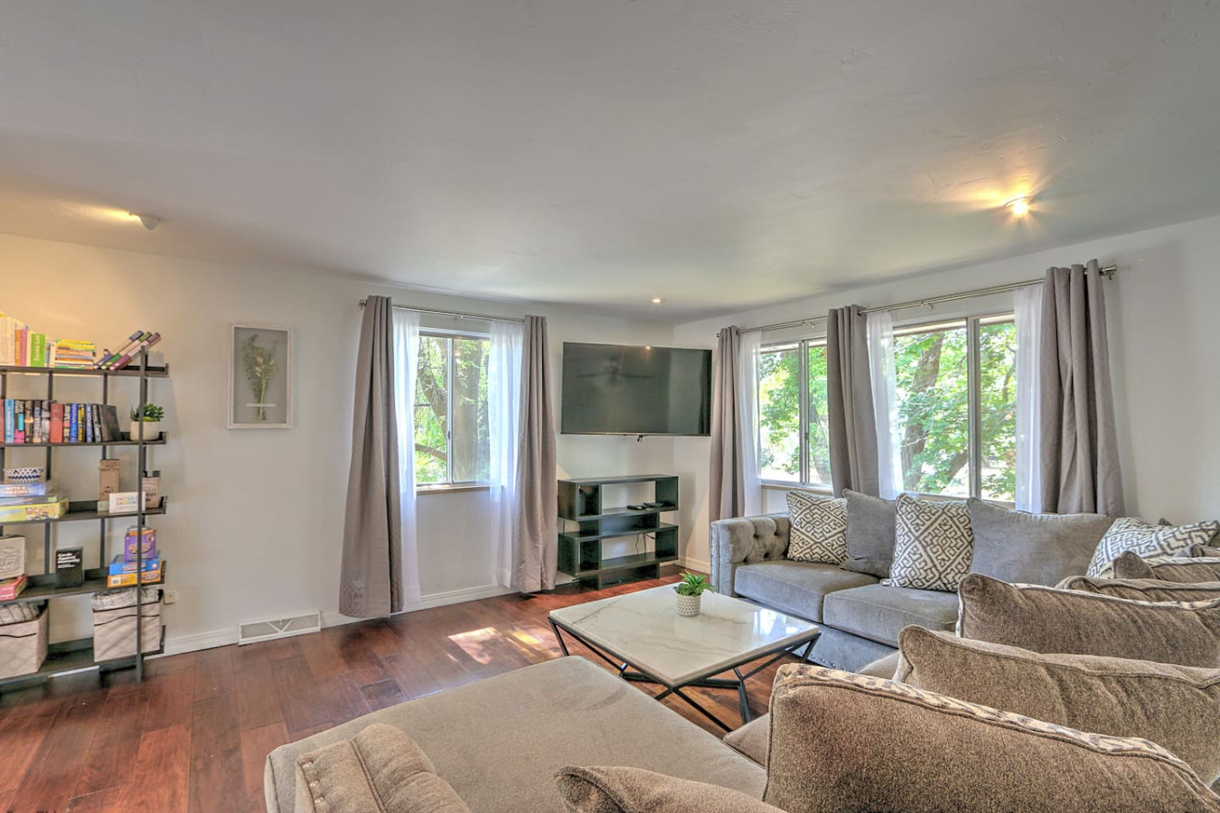 Spacious living room with large Smart TV