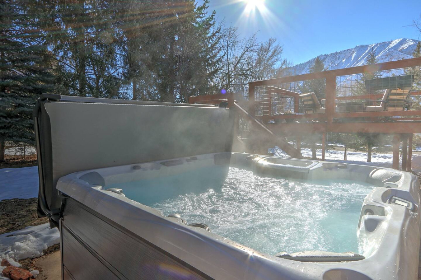 Brand new hot tub with 7 seats and mountain views