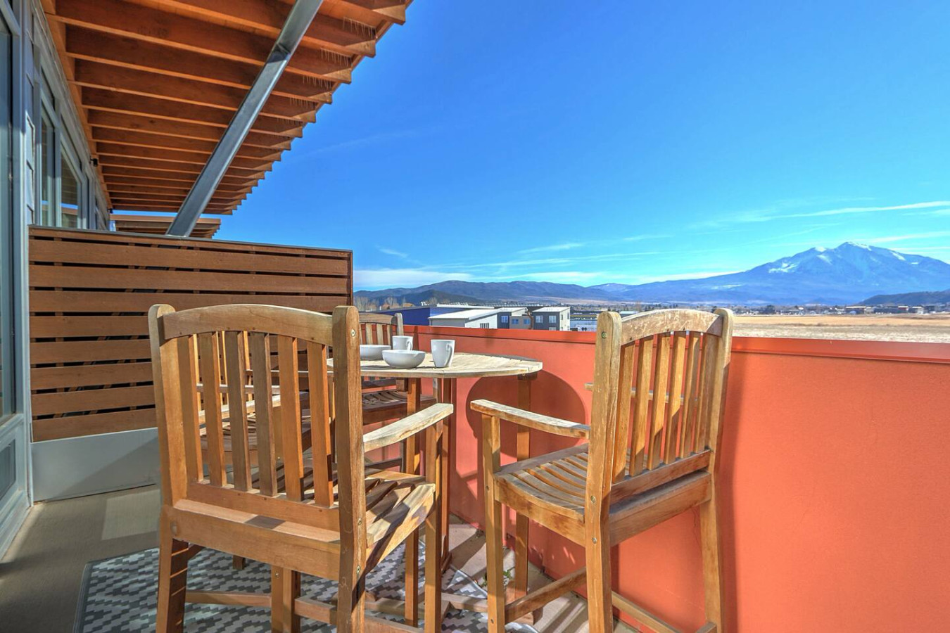 Balcony with bistro seating and Mt. Sopris views