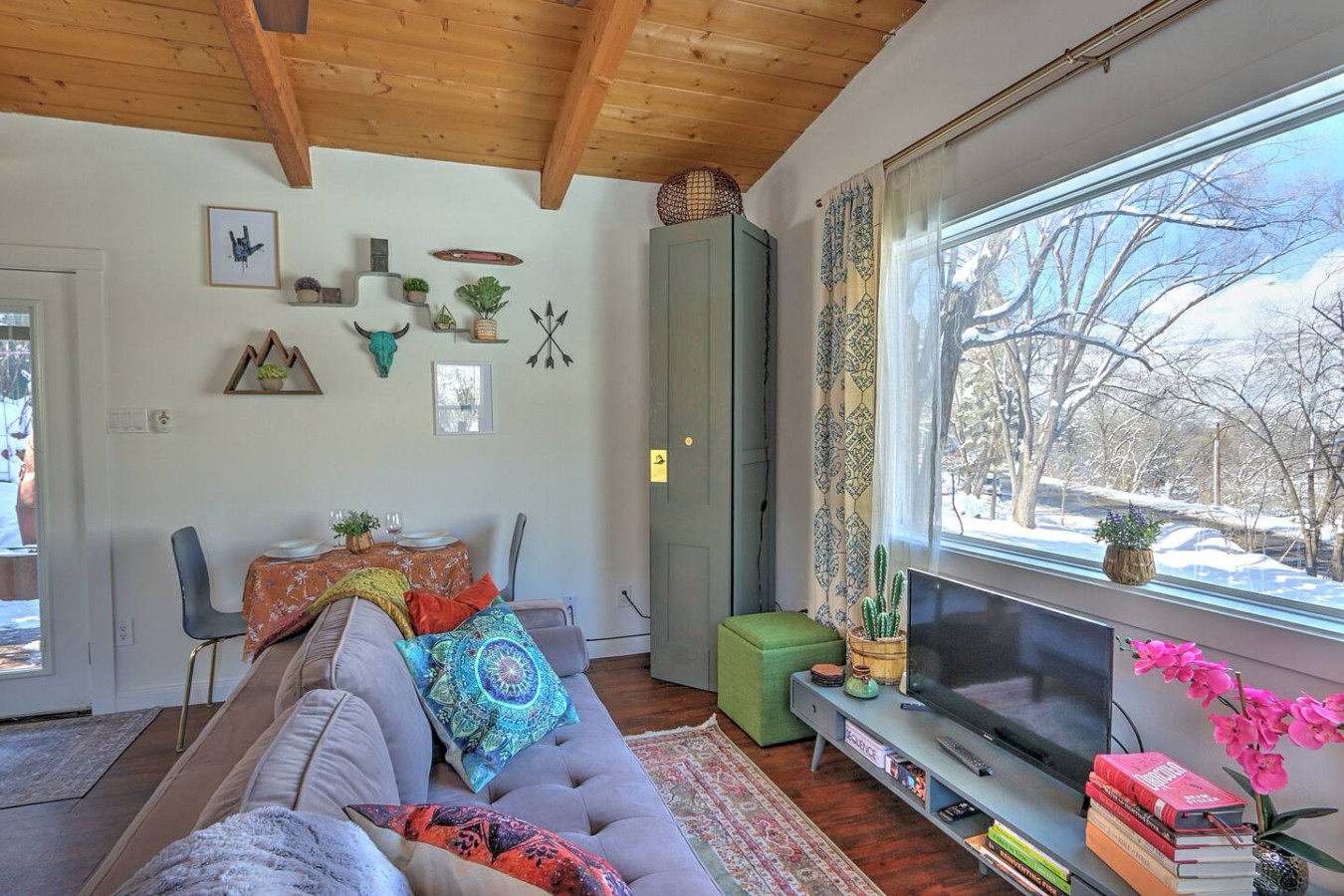 Living area with comfortable furnishings and  mountain views
